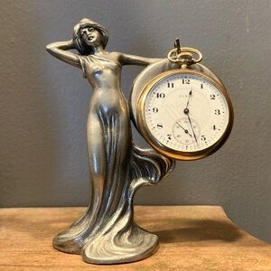 Vintage pocket watch stand, very heavy, and most likely pewter